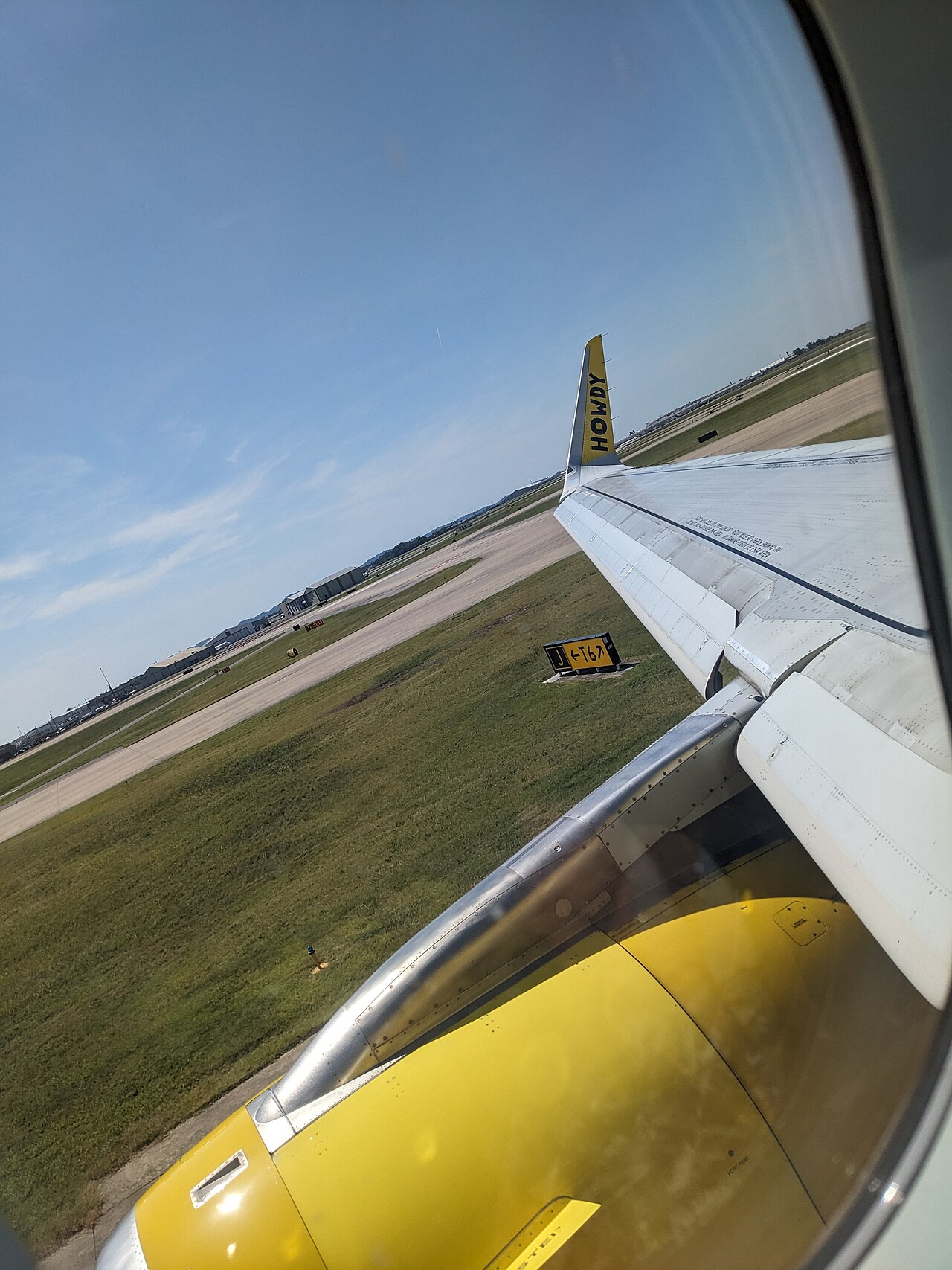 View of an airplane wing on the tarmac